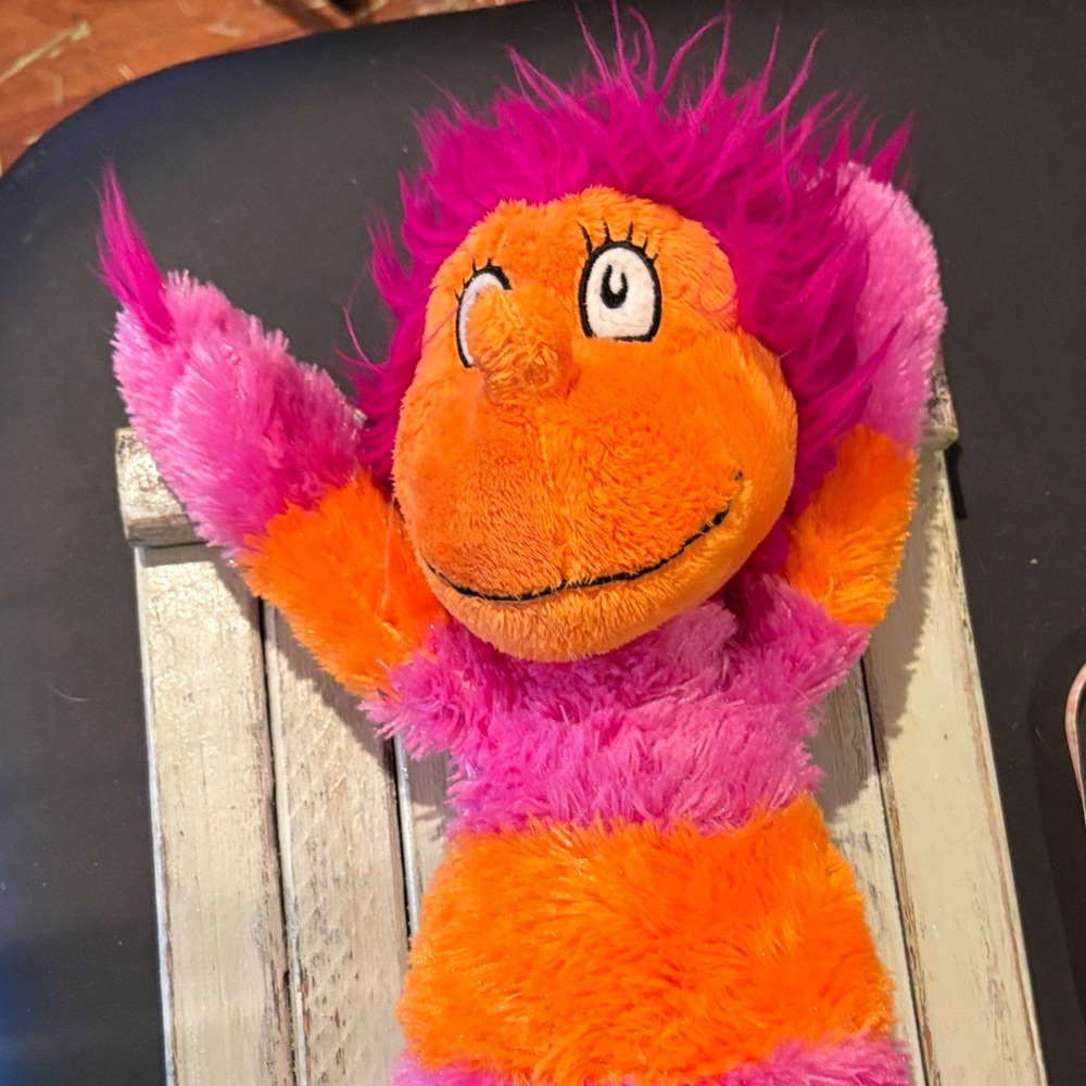 Vibrant Pink and Orange Stuffed Animal